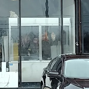 a car parked in front of a store