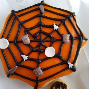 a spider web decorated cookie