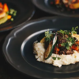 Beef stew (goulash) over pureed potatoes