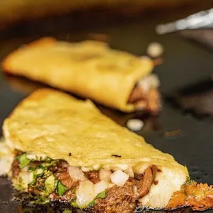 ows a close up of a piece of food on a pan