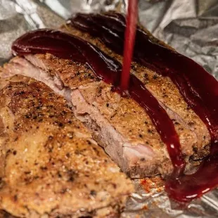 ows a piece of meat on tin foil