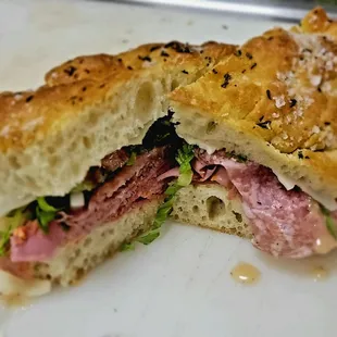 The Anna, capricola Italian salami lettuce tomato onion provolone vinaigrette on housemate focaccia.