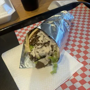 Mix beef and lamb pita with white sauce