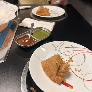 Chicken samosa - too delicious that I ate half before the pic. So sorry. The sauces that go with it are great.