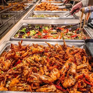 a buffet full of food