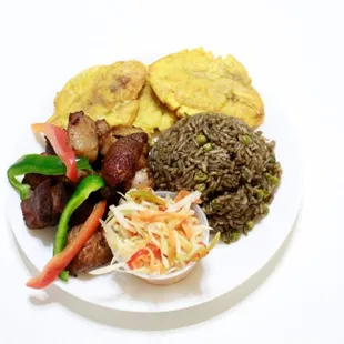Black rice fried pork plaintain pikliz