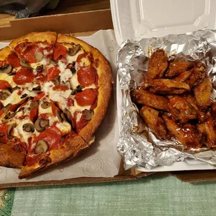 Medium pepperoni and mushroom pizza with BBQ wings.
