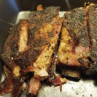 Got ribs to-go (the appetizer size). They are super crusty with seasoning and oh so smoky and delicious.