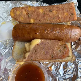 My bread stacked with jalapeño sausage with bbq on the side