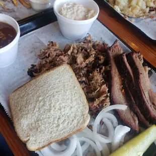 Pulled pork dinner with a side of sliced beef.