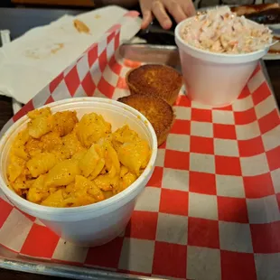 Mac &amp; cheese, coleslaw, and corn bread muffins.