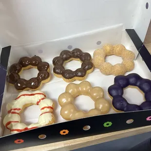a dozen donuts in a box