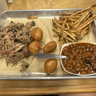 Eastern chopped plate with French fries and baked beans.