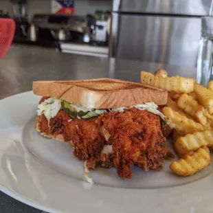 a fried chicken sandwich and french fries
