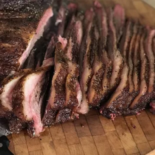 sliced beef on a cutting board