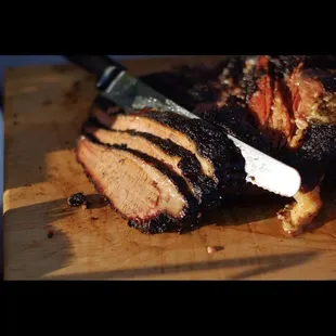 a piece of meat on a cutting board