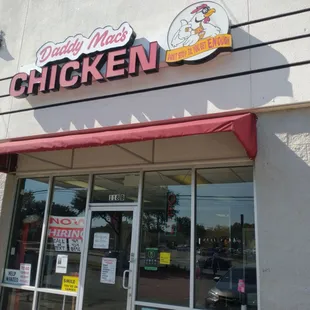Front door. Now hiring help wanted sign in the window. Daddy Mac's sign says "Don't stop till you get enough