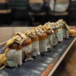 a sushi roll on a tray