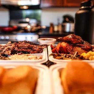 Two three-meat plates with collards, mac, and slaw