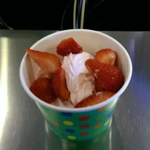 My froyo getting weighed at check out on the scale.