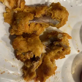 Chicken HOT WINGS (10PC), soggy, heavily breaded and no crisp.