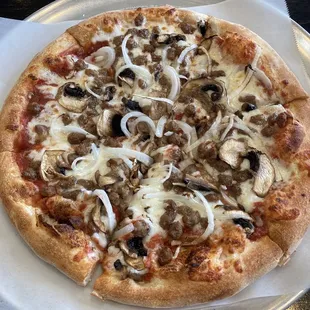 10&quot; 3 topping pie of beef, mushrooms and onions. With tax about $15.