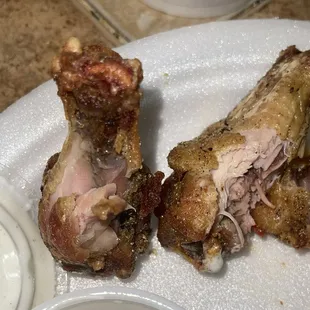 Undercooked wings, there were more pink and red but the smell was too much to have a photoshoot.