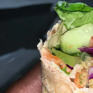 Falafel wrap with hair.
