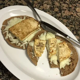 Allsoy pita pizza. Looks kinda bad but was actually pretty good, would have preferred the tofu to be diced and sauce to be on it