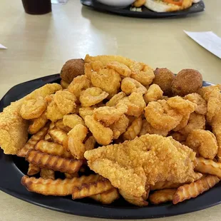 Fish and shrimp with hush puppies and fries
