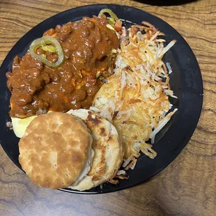 Daddy omelette (EVERYTHING BUT THE KITCHEN SINK!) with chili, biscuit, hash browns.