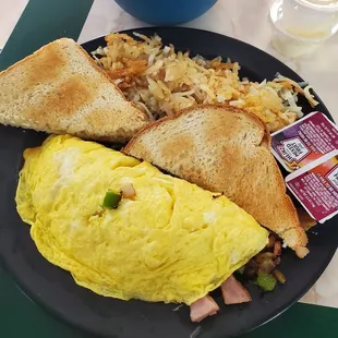 Western omelette plate with a side of grits