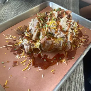 There is a potato under all that goodness!