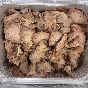 Tri-tip is a crowd favorite, it comes with 2 sides of regular &amp; spicy BBQ sauce.