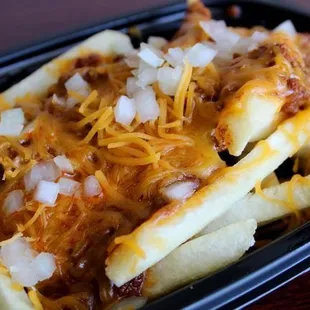 a close up of a plate of fries