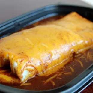a burrito in a plastic container