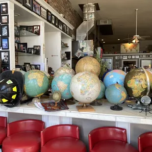 a variety of globes on a counter