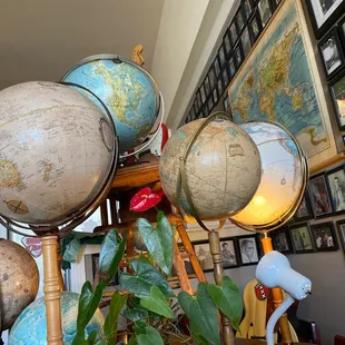 a variety of globes on display