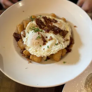 Poutine with eggs and bacon