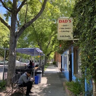 a man sitting on a bench