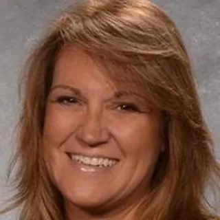 Suzanne K.