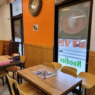 a table and chairs in a restaurant