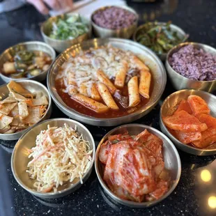 Kalbi tteokbokki, side dishes and purple rice