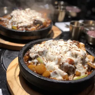 Kalbijjim (braised short rib) w/ rice cakes and topped w/ torched cheese!!