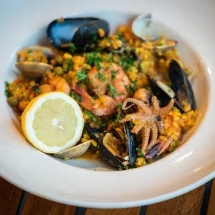 a bowl of seafood and rice