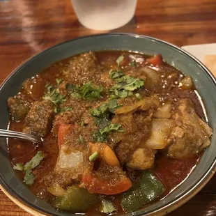 Burmese fish curry with red snapper. Great over coconut rice!