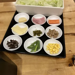 Toppings came after soup and noodles