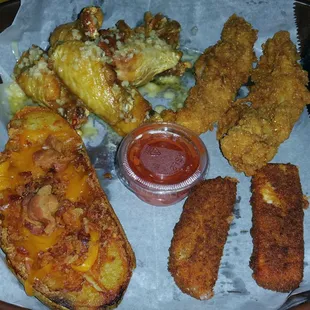 Power Play Platter of appetizers $12.95  w/ 6 wings, 2 grouper fingers, 2 cheese sticks &amp; a loaded potato skin