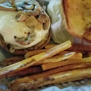 The half-pound burger with Swiss &amp; mushrooms.