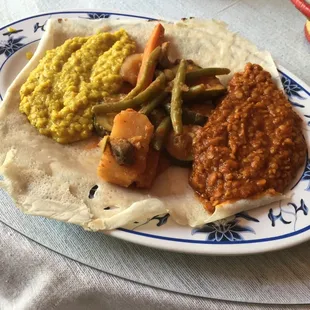 Split pea with Berbere sauce, lentils with mild sauce, and veggies